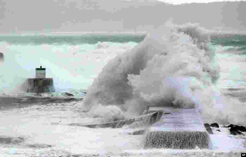 A wave hits the seawall at Saint Jean de Luz, southwestern France.
