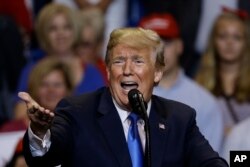 President Donald Trump speaks during a rally, Aug. 2, 2018, at Mohegan Sun Arena at Casey Plaza in Wilkes Barre, Pa.