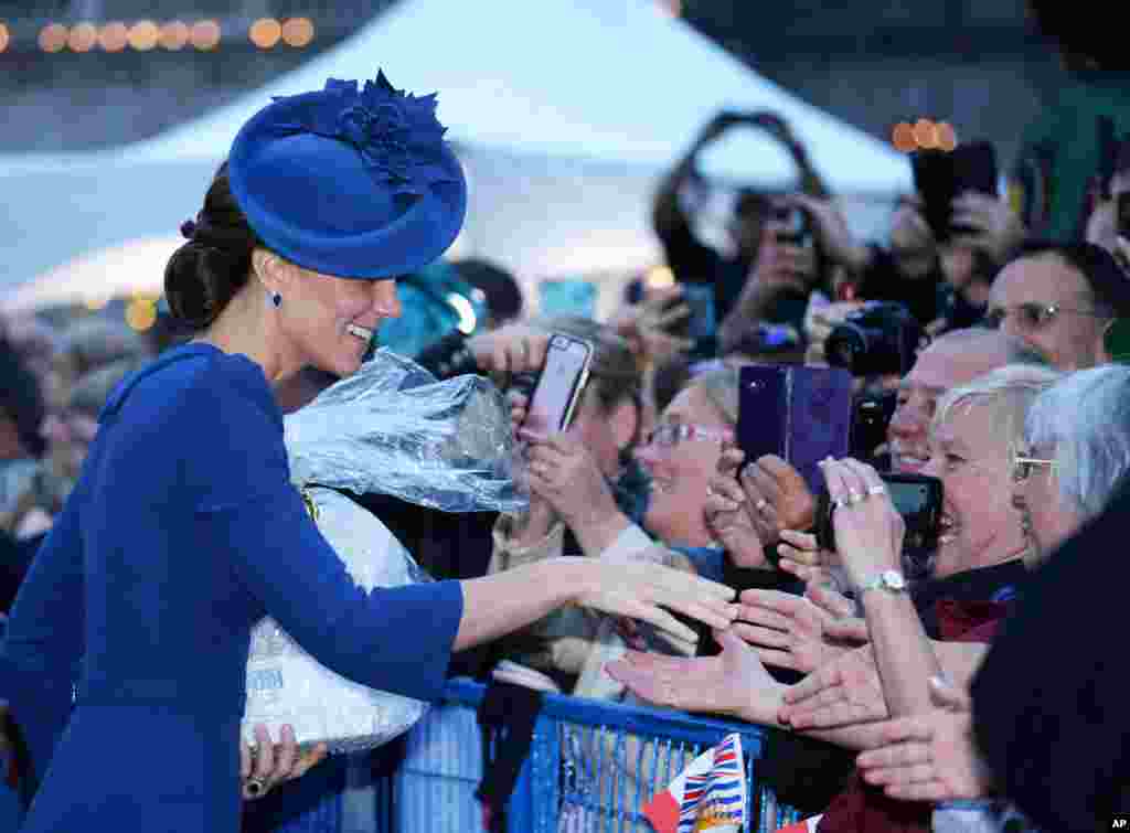 Catherine, Duchess of Cambridge greets people at the British Columbia Parliament Buildings, Sept. 24, 2016.