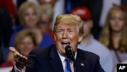 FILE - President Donald Trump speaks during a rally, Aug. 2, 2018, at Mohegan Sun Arena at Casey Plaza in Wilkes Barre, Pa.