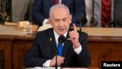 Izraelski premijer Benjamin Netanyahu tokom govora u američkom Kongresu. (REUTERS/Craig Hudson)