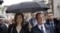 France's President Francois Hollande, right, and his companion Valerie Trierweiler take part in a march as part of a ceremony in tribute to the memory of Nazi victims in Tulle, southwestern France, June 9, 2012.
