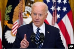 FILE - President Joe Biden speaks during a news conference in the East Room of the White House, March 25, 2021, in Washington.