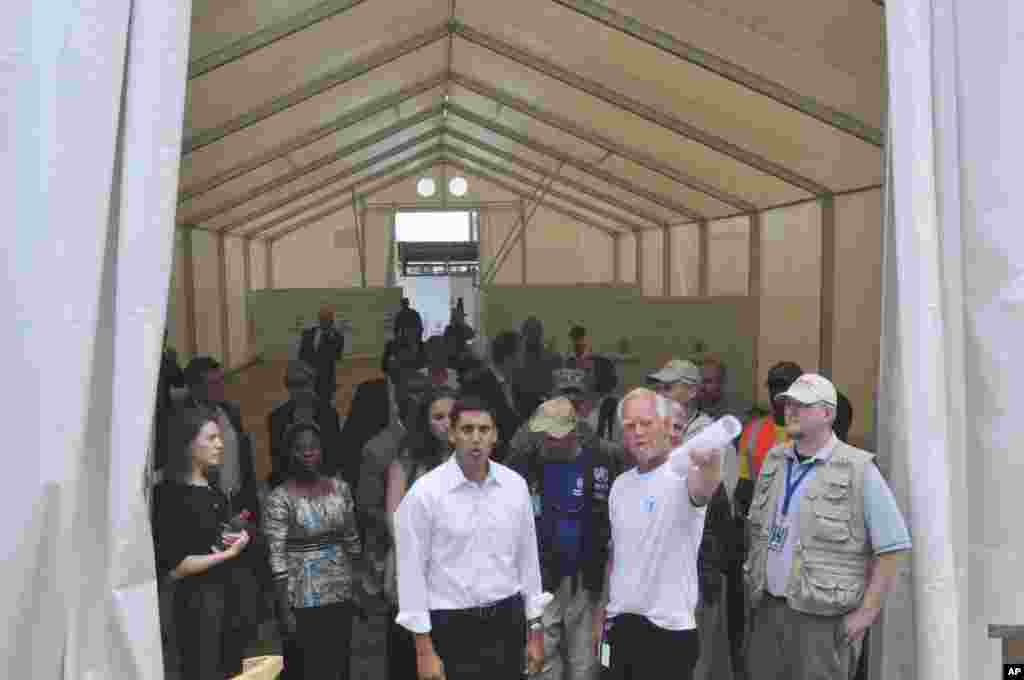 Rajiv Shah, the head of USAID, inspects a newly-built Ebola treatment center in Monrovia, Liberia, Oct. 14, 2014.