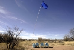 Water tanks from the NGO Humane Borders are placed in the desert as supply for immigrants crossing the area near Arivaca, Arizona, March 23, 2006.