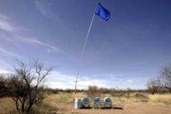 Water tanks from the NGO Humane Borders are placed in the desert as supply for immigrants crossing the area near Arivaca, Arizona, March 23, 2006.