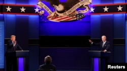 Donald Trump and Joe Biden participate in their first 2020 presidential campaign debate 