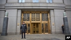 A court officer stands outside U.S. Federal Court, where two nephews of Venezuela's powerful first lady are facing arraignment after being arrested in Haiti, Nov. 12, 2015, in New York.