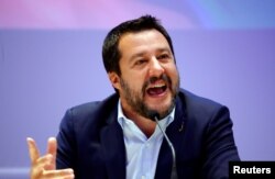 FILE - Matteo Salvini, Italy's Deputy Prime Minister and leader of the far-right League Party, speaks as he launches campaigning for the European elections, in Milan.
