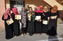 Libya's National Commission for Human Rights meets with a group of displaced women in the city of Tawargha, to raise awareness about the importance of women's participation in the political process. (Photo credit: Zahia Faraj-Ali)