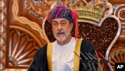 FILE - Oman's Sultan Haitham bin Tariq al-Said speaks at the Royal Family Council in Muscat, Oman, Jan. 11, 2020.