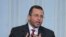 Egypt's new Prime minister, Hisham Qandil, speaks during his first news conference in Cairo, August 2, 2012
