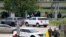Emergency personnel respond outside the Pentagon Metro area, Aug. 3, 2021, at the Pentagon in Washington. A Pentagon police officer was stabbed to death at the transit station and his attacker then shot himself, authorities said.