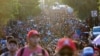 Migrants walk in a caravan during U.S. Presidential election day, in an attempt to reach Mexico's northern border, in Tapachula, Mexico Nov. 5, 2024.