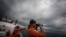 Indonesian national rescue personnel conduct search for missing Malaysia Airlines flight MH370, Andaman Sea, March 15, 2014.