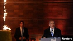 Israel's Prime Minister Benjamin Netanyahu speaks during the opening ceremony of Holocaust Memorial Day at the Yad Vashem Holocaust Memorial in Jerusalem, April 23, 2017. 