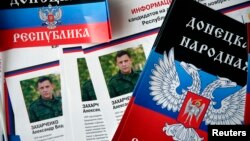 Election information sheets are displayed with portraits of Alexander Zakharchenko, separatist leader of the self-proclaimed Donetsk People's Republic, during preparations for the upcoming election in Donetsk, eastern Ukraine. 