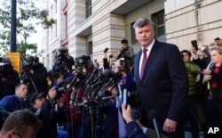 Kevin Downing, attorney for Paul Manafort, turns away after speaking to reporters outside federal court in Washington, Oct. 30, 2017.