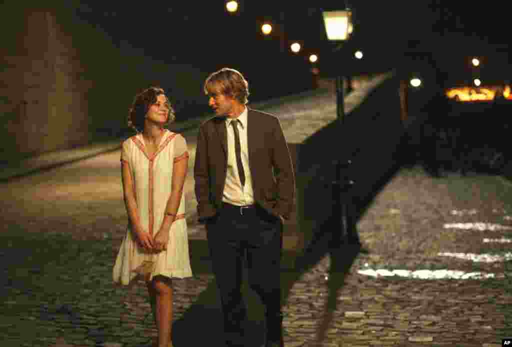 Marion Cotillard and Owen Wilson in "Midnight in Paris," nominated for Best Picture, Best Original Screenplay, and for Woody Allen’s directing.