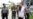FILE - Singaporean journalist Lau Hon Meng, center left, and Malaysian journalist Mok Choy Lin, both accused of flying drones illegally over parliament buildings, are escorted during their trial at a court in Naypyitaw, Myanmar, Nov. 10, 2017.