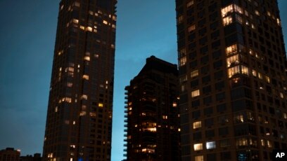 transformer explosion bathes new york skyline in blaze of blue