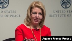 FILE - Catherine Russell, then ambassador-at-large for global women’s issues at the U.S. State Department, speaks during a panel discussion at the United States Institute of Peace in Washington, Jan. 28, 2015.