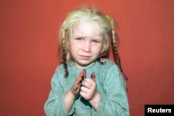 A four-year-old girl, found living with a Roma couple in central Greece, is seen in a handout photo distributed by the Greek police and obtained by Reuters, Oct. 18, 2013.