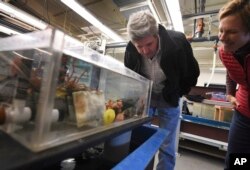 U.S. Secretary of State John Kerry inspects marine life at the Crary Science Center in McMurdo Station in Antarctica, Nov. 12, 2016.
