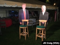 Cardboard cutouts of both candidates on display during a breakfast at the home of U.S. ambassador in Nairobi, Kenya.