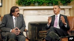 President Barack Obama meets with Emir Sheikh Hamad bin Khalifa Al-Thani of Qatar in the Oval Office of the White House in Washington, April 23, 2013.