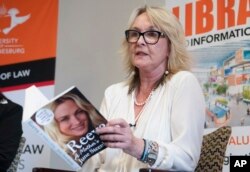 June Steenkamp, the mother of the late Reeva Steenkamp who was shot dead by her boyfriend Oscar Pistorius in 2013, speaks at the launch of her book, ‘Reeva, A Mothers Story.’ in Johannesburg, March 10, 2015.