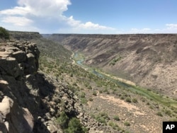 This August 2018 photo shows the Taos Gorge in New Mexico. Hikers have embarked on a 500-mile (805-kilometer) expedition that will traverse New Mexico. The mission: Chart out the best route and identify what challenges might lie ahead as the state moves c