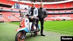 Roger Daltrey and Pete Townshend of The Who pose for a picture at Wembley Stadium in London, March 13, 2019.
