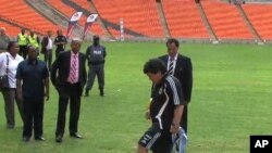 Argentina's national team coach, Diego Maradona inspected South Africa's stadiums and said he was impressed