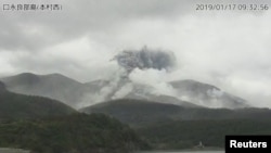 A video grab from the Japan Meteorological Agency's live camera image shows an eruption of Kuchinoerabu Island in Yakushima town, Kagoshima prefecture, southwestern Japan, January 17, 2019. 