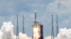 FILE - The Long March 5 Y-4 rocket, carrying an unmanned Mars probe of the Tianwen-1 mission, takes off from Wenchang Space Launch Center in Wenchang, Hainan Province, China, July 23, 2020. 