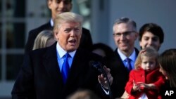 FILE - President Donald Trump speaks to participants of the annual March for Life event, in the Rose Garden of the White House in Washington, Jan. 19, 2018.