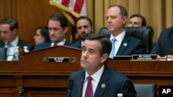 In a July 24, 2019 photo, Rep. John Ratcliffe, R-Texas, a member of the House Intelligence Committee, questions Robert Mueller.