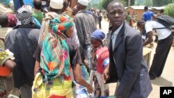 Muslims with their belongings are seen before they are escorted by French peacekeepers from their homes in Bangui, Central African Republic, April 27, 2014