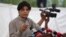 FILE - Pakistani Interior Minister Chaudhry Nisar Ali Khan speaks to reporters in Islamabad, Sept. 23, 2016. He said Friday that as a "goodwill gesture" Pakistan would removed Cyril Almeida's name from a travel ban.