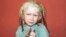 A four-year-old girl, found living with a Roma couple in central Greece, is seen in a handout photo distributed by the Greek police and obtained by Reuters, Oct. 18, 2013. 
