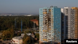 A view shows a damaged multi-story residential building following an alleged Ukrainian drone attack in Ramenskoye, in the Moscow region, Russia, Sept. 10, 2024. 