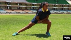 Banita Dodhia, 14, warms up before another workout in preparation for the javelin competition at the IAAF World Under 18 Championships in July in Nairobi. (L. Ruvaga/VOA)