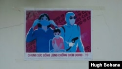  A COVID-19 poster on a wall in Da Nang, Vietnam. (High Bohane/VOA) 