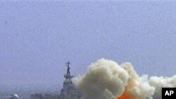 A destroyer of the South China Sea Fleet of the Chinese Navy fire a missile during a training in South China Sea, (File)