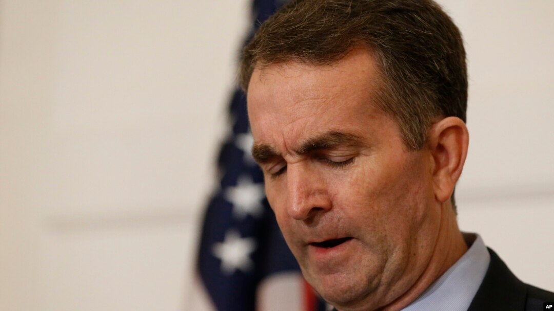 Virginia Gov. Ralph Northam pauses during a news conference in the Governor's Mansion in Richmond, Feb. 2, 2019. Northam is under fire for a racially insensitive photo that appeared in his college yearbook.