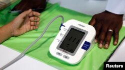 A school child has his blood pressure checked in Dallas, Texas.