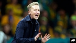 FILE - Canada's head coach Bev Priestman gestures during the Women's World Cup Group B soccer match between Australia and Canada in Melbourne, Australia, July 31, 2023. 