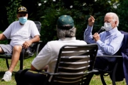 Democratic presidential candidate former Vice President Joe Biden speaks during an event with local union members in the backyard of a home in Lancaster, Pennsylvania, Sept. 7, 2020.