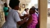 A health worker administers a dose of Ebola vaccine to a man at the Christian Maternity Hospital in Freetown, Sierra Leone, on Dec. 5, 2024.